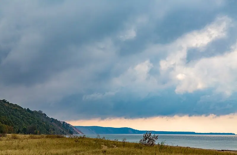 Lake Superior shoreline under a stormy sky