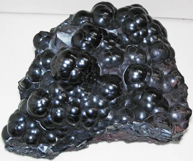 Black botryoidal hematite, Ishpeming, museum display